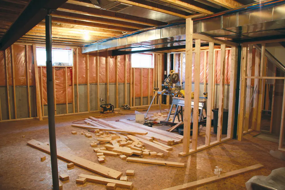 Calabasas home renovation in progress with wood framing and construction equipment